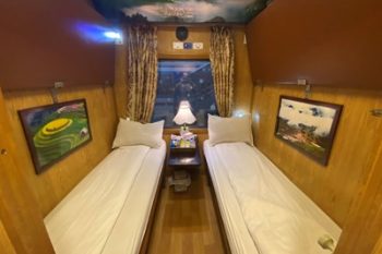 Luxurious cabin interior with leather seats and modern amenities on the Sapaly Express Train Hanoi to Lao Cai Sapa