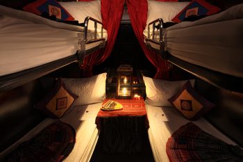 Luxurious cabin interior with leather seats and modern amenities on the Chapa Express Train Hanoi to Lao Cai Sapa