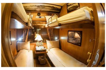Luxurious cabin interior with leather seats and modern amenities on the Sapaly Express Train Hanoi to Lao Cai Sapa