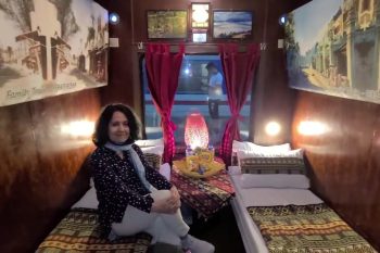 Luxurious cabin interior with leather seats and modern amenities on the Family Express Train Hanoi to Lao Cai Sapa