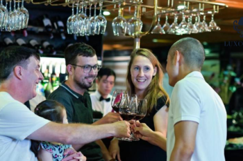 Guests enjoying drinks on Alova Premium Cruise in Ha Long Bay
