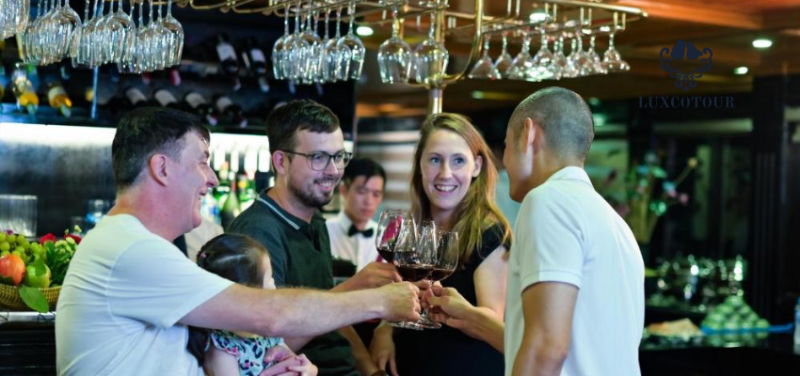 Guests enjoying drinks on Alova Premium Cruise in Ha Long Bay