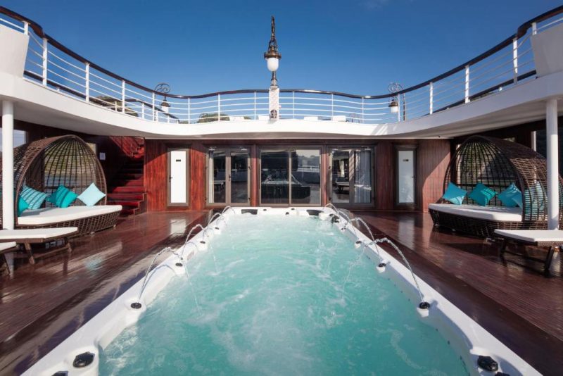 Luxurious deck with a jacuzzi on Ambassador Cruise in Ha Long Bay