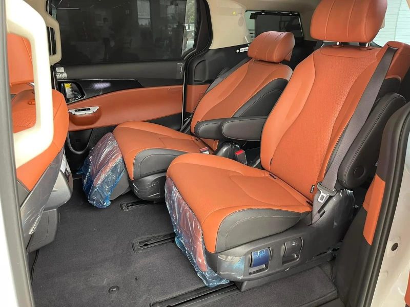 Luxco Travels - Spacious Interior of Kia Carnival Luxury 7-Seater from Hanoi to Halong Bay