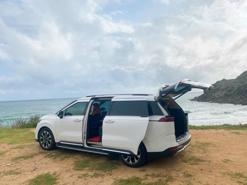 Luxco Travels - Kia Carnival 7-Seater by the Beach from Hanoi to Halong Bay