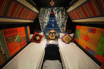 Luxurious cabin interior with leather seats and modern amenities on the Chapa Express Train Hanoi to Lao Cai Sapa