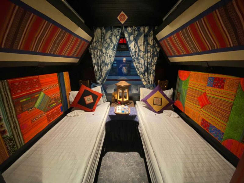 Luxurious cabin interior with leather seats and modern amenities on the Chapa Express Train Hanoi to Lao Cai Sapa