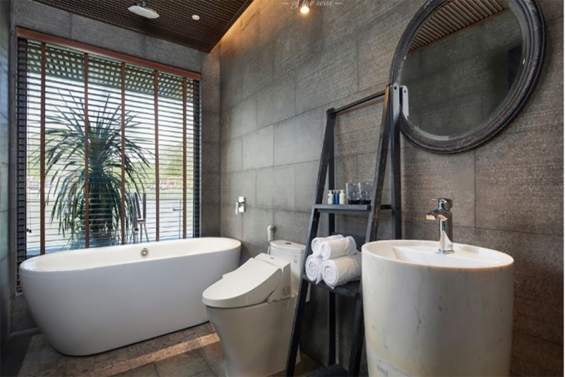 Luxurious bathroom with modern amenities and Ha Long Bay view on Elite of the Seas Cruise