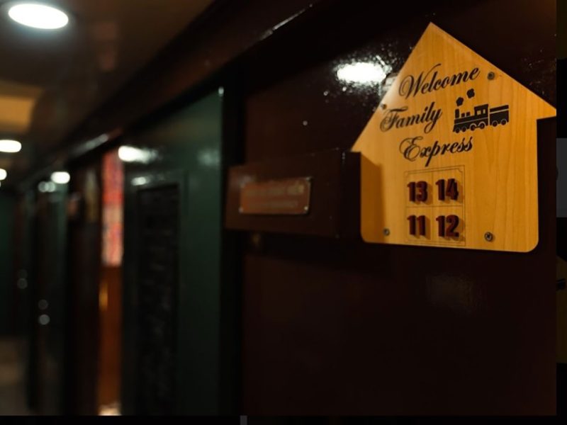 Luxurious cabin interior with leather seats and modern amenities on the Family Express Train Hanoi to Lao Cai Sapa