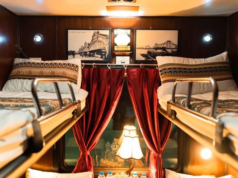 Luxurious cabin interior with leather seats and modern amenities on the Family Express Train Hanoi to Lao Cai Sapa