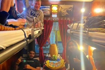 Luxurious cabin interior with leather seats and modern amenities on the Family Express Train Hanoi to Lao Cai Sapa