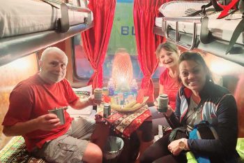 Luxurious cabin interior with leather seats and modern amenities on the Family Express Train Hanoi to Lao Cai Sapa