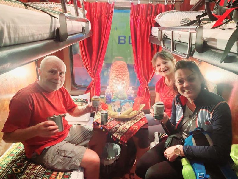 Luxurious cabin interior with leather seats and modern amenities on the Family Express Train Hanoi to Lao Cai Sapa
