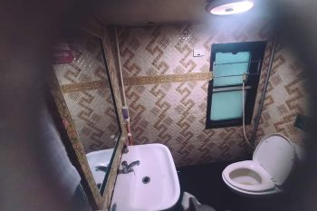 Luxurious cabin interior with leather seats and modern amenities on the Family Express Train Hanoi to Lao Cai Sapa