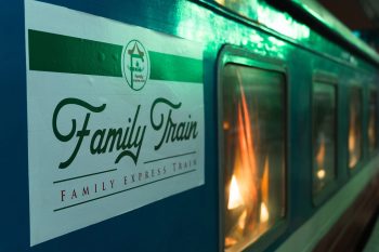 Luxurious cabin interior with leather seats and modern amenities on the Family Express Train Hanoi to Lao Cai Sapa