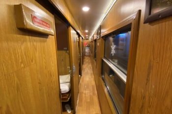 Luxurious cabin interior with leather seats and modern amenities on the Sapaly Express Train Hanoi to Lao Cai Sapa