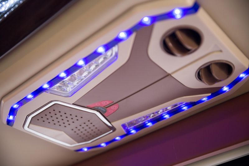 Interior lighting and air conditioning controls of a 16-seater Felix Limousine for Hanoi to Halong Bay transfers