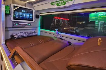 Luxurious cabin interior with leather seats and modern amenities on the HK Open Tour bus from Hanoi to Sapa