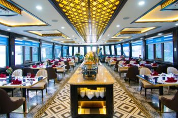Buffet setup and elegant dining area on La Casta luxury cruise in Ha Long Bay.