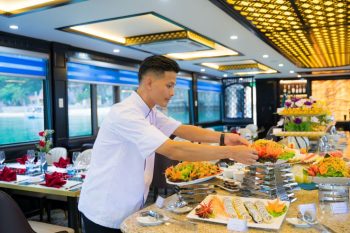 Chef preparing a luxurious buffet on La Casta Daily Cruise in Ha Long Bay