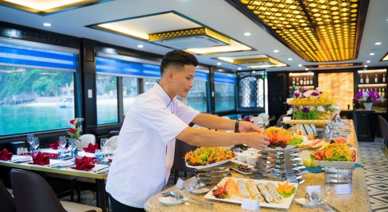 Chef preparing a luxurious buffet on La Casta Daily Cruise in Ha Long Bay
