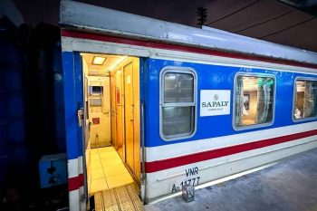 Luxurious cabin interior with leather seats and modern amenities on the Sapaly Express Train Hanoi to Lao Cai Sapa