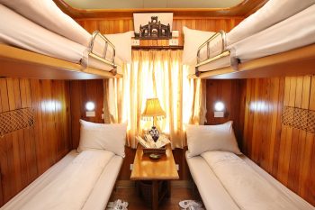 Luxurious cabin interior with leather seats and modern amenities on the Sapaly Express Train Hanoi to Lao Cai Sapa