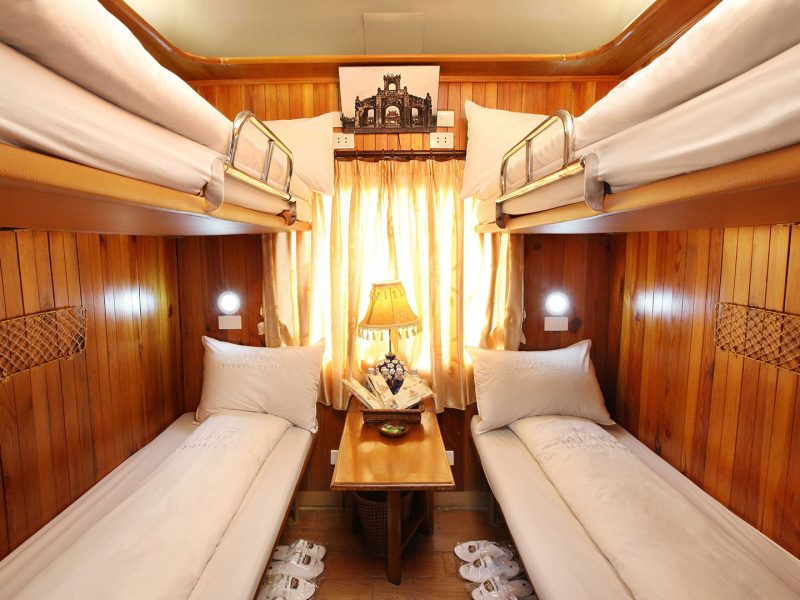 Luxurious cabin interior with leather seats and modern amenities on the Sapaly Express Train Hanoi to Lao Cai Sapa