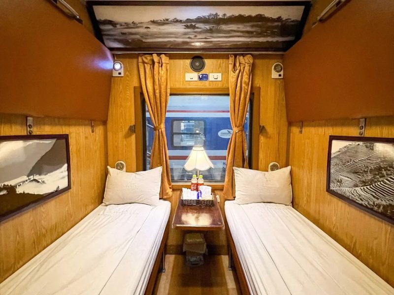 Luxurious cabin interior with leather seats and modern amenities on the Sapaly Express Train Hanoi to Lao Cai Sapa
