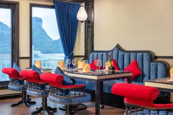 Luxury dining area on Verdure Lotus Cruise with scenic Ha Long Bay view