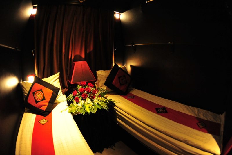 Luxurious cabin interior with leather seats and modern amenities on the Chapa Express Train Hanoi to Lao Cai Sapa