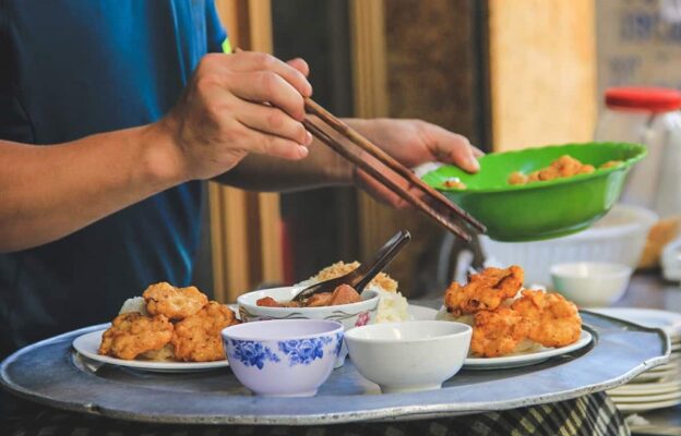 Traditional squid cake being served in Ha Long Bay