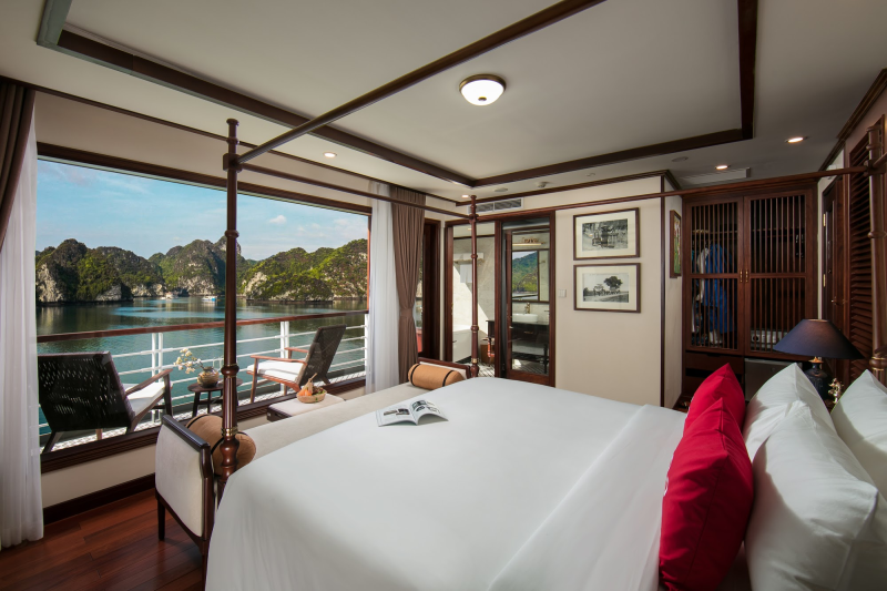 Luxurious bedroom with ocean view on Heritage Cruise Binh Chuan in Ha Long Bay