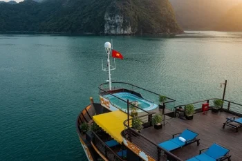 Luxurious deck with a swimming pool on Nostalgia Cruise in Ha Long Bay