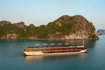 Nostalgia Cruise sailing through Ha Long Bay's stunning limestone islands