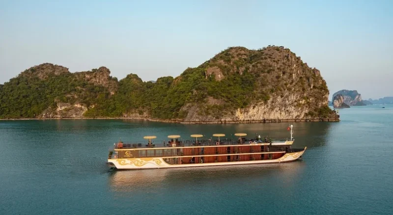 Nostalgia Cruise sailing through Ha Long Bay's stunning limestone islands