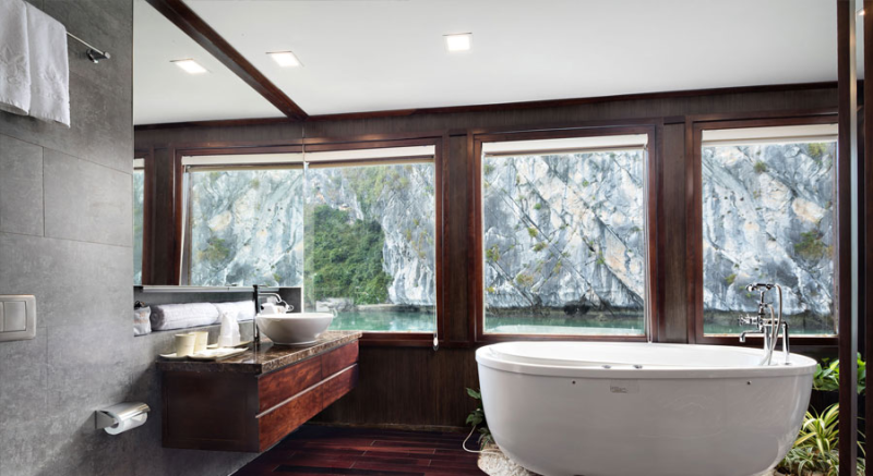 Luxurious bathroom with a view on Orchid Classic Cruise in Ha Long Bay