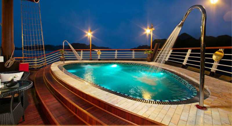 Luxurious onboard pool at night on the Orchid Trendy Cruise, Ha Long Bay, Vietnam - Perfect for relaxation and enjoying the scenic views
