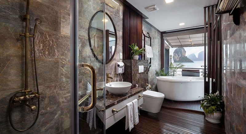 Luxurious bathroom with a view on the Orchid Trendy Cruise, Ha Long Bay, Vietnam - Featuring a spacious bathtub and elegant design