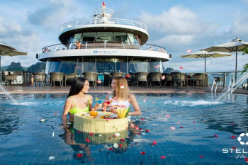 Stellar of Seas Cruise Departure Halong International Pier swimming pool guest dining tray check-in experience Vietnam tour private trip transfer car Halong Bay tours Luxco Travel