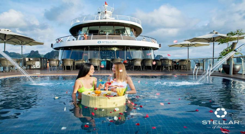 Stellar of Seas Cruise Departure Halong International Pier swimming pool guest dining tray check-in experience Vietnam tour private trip transfer car Halong Bay tours Luxco Travel