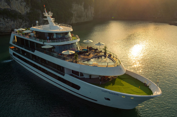 Stellar of Seas Cruise Departure Halong International Pier large cruise ship sunrise sea activities kayak tourists Vietnam tour private trip transfer car Halong Bay tours Luxco Travel