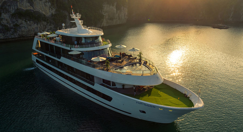 Stellar of Seas Cruise Departure Halong International Pier large cruise ship sunrise sea activities kayak tourists Vietnam tour private trip transfer car Halong Bay tours Luxco Travel