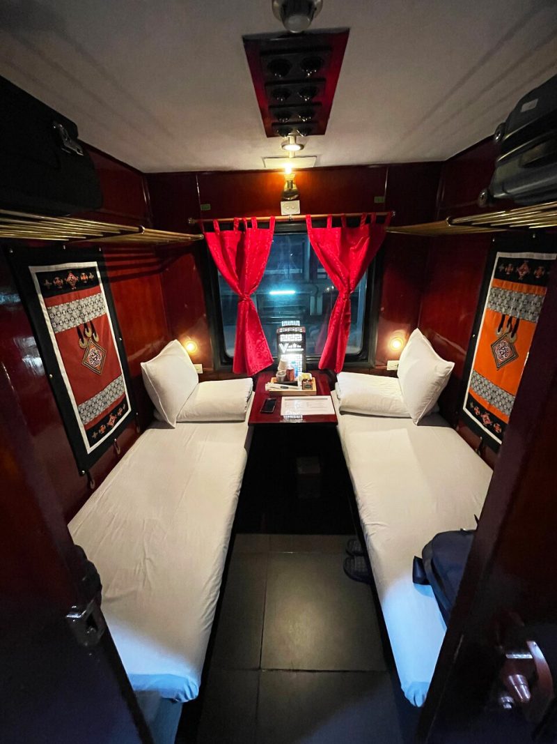Luxurious cabin interior with leather seats and modern amenities on the Vic Express Train Hanoi to Lao Cai Sapa