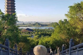 Bai Dinh Trang An Mua Cave Day Tour from Hanoi Vietnam LuxcoTravels Buddhist pagodas scenic boat ride karst scenery
