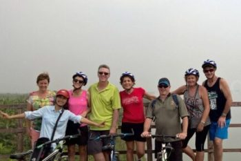 Biking tour of Hanoi backstreet Long Bien Bridge Vietnam LuxcoTravels scenic cycling adventure