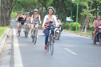 Biking tour of Hanoi backstreet Vietnam - LuxcoTravels explore local culture street food historical landmarks cycling adventure