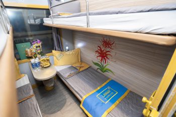 Luxurious cabin interior with leather seats and modern amenities on the Laman Express Train Hanoi to Lao Cai Sapa