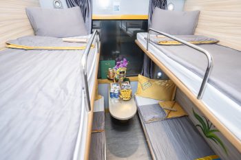 Luxurious cabin interior with leather seats and modern amenities on the Laman Express Train Hanoi to Lao Cai Sapa