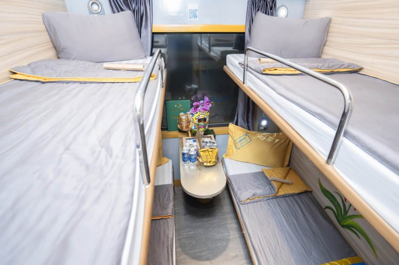 Luxurious cabin interior with leather seats and modern amenities on the Laman Express Train Hanoi to Lao Cai Sapa